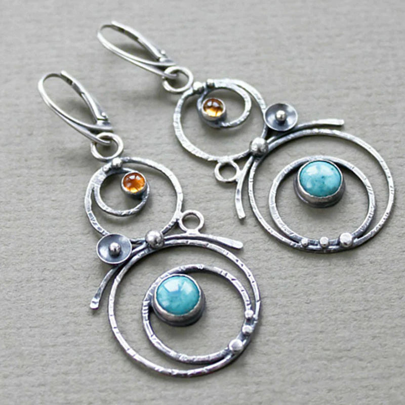 Orecchini con pietre blu e arancioni