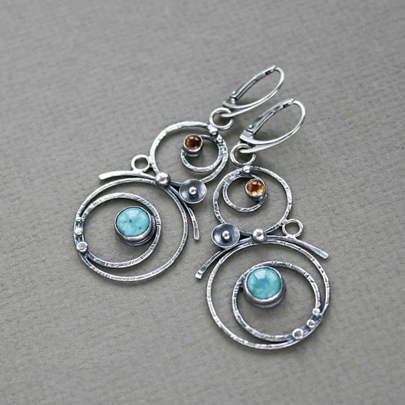 Orecchini con pietre blu e arancioni