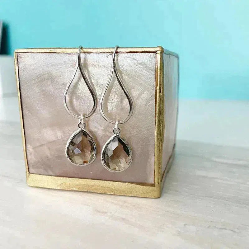 Orecchini pendenti con apertura a taglio