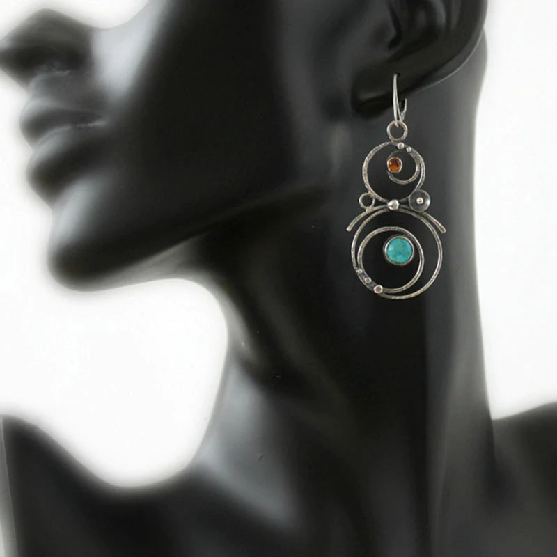 Orecchini con pietre blu e arancioni