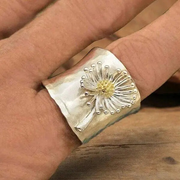 Anello a fascia larga con margherite in fiore