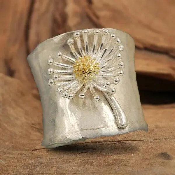 Anello a fascia larga con margherite in fiore