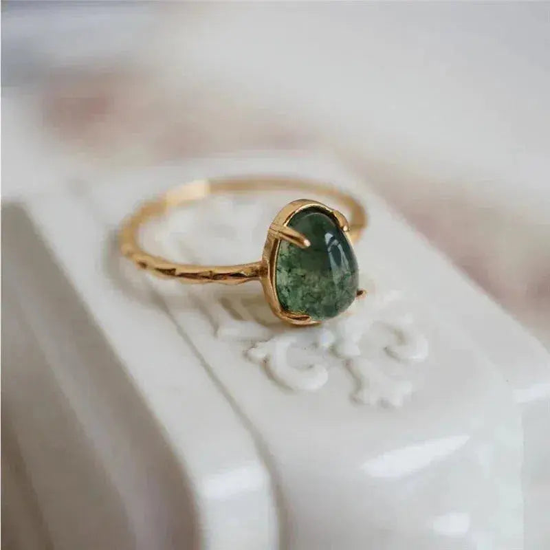 anello di lusso a goccia d'acqua verde in oro