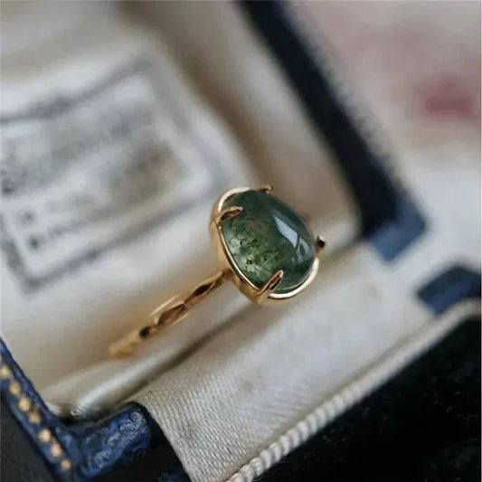 anello di lusso a goccia d'acqua verde in oro