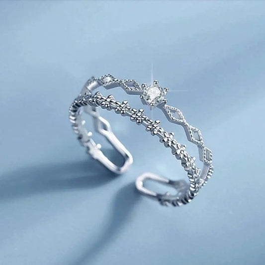 Anello elegante regolabile con zirconi in argento sterling