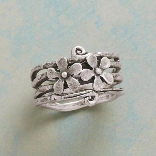 Anello d'Argento a Spirale Vintage con Margherite Cave
