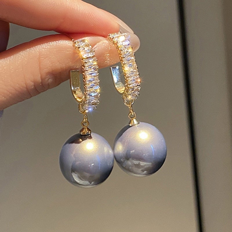 Orecchini di lusso con perla elegante e zirconi