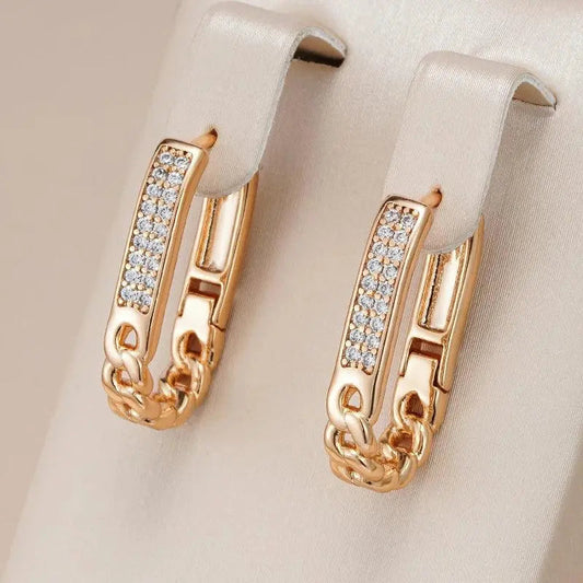 Orecchini eleganti a catena con zirconia in oro