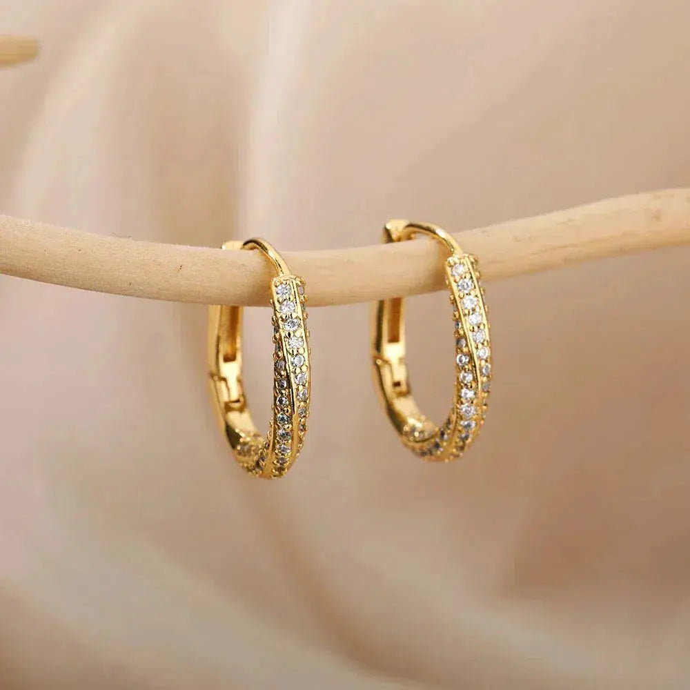 Orecchini minimalisti irregolari color oro lucido