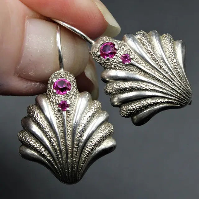 Orecchini vintage a conchiglia con cristalli viola