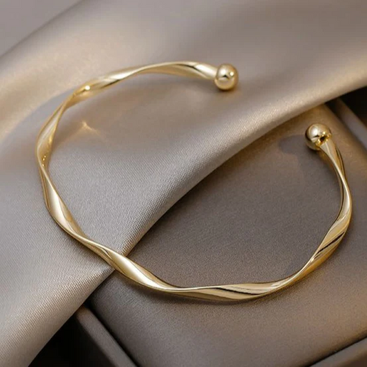 Bracciale aperto dorato elegante