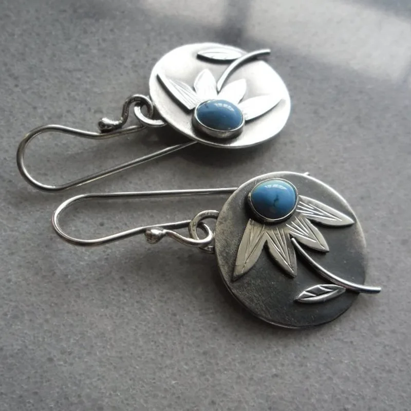 Orecchini vintage in argento con fiore e pietra blu