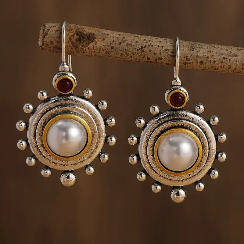Orecchini vintage in argento e oro incastonati con perle
