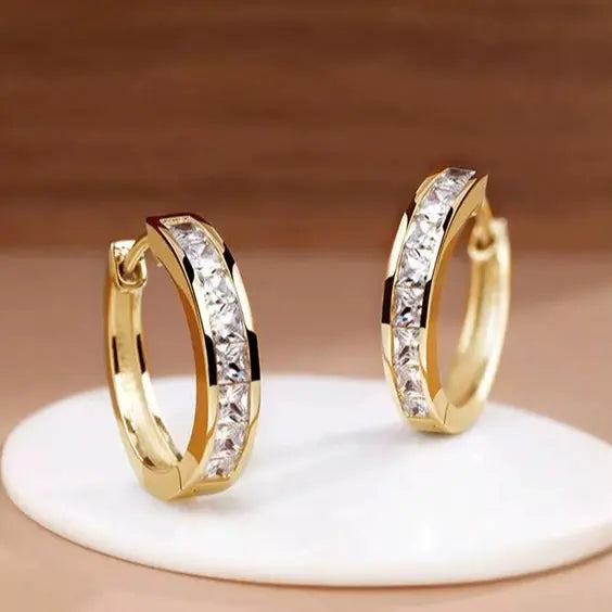 Orecchini eleganti in oro e cristallo