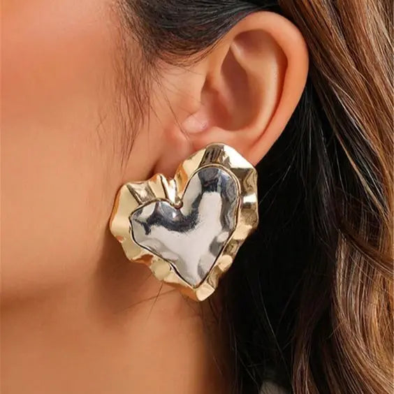 Orecchini a cuore in oro e argento