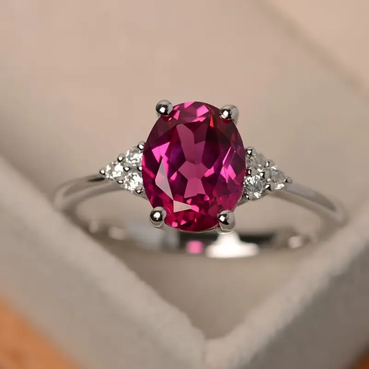 anello d'argento nobile con pietra rosa ovale