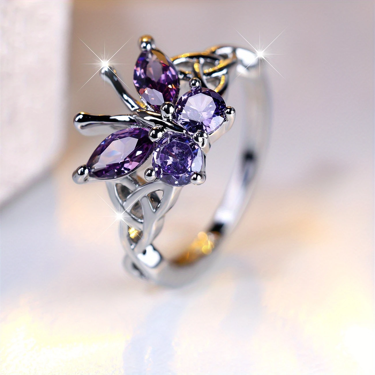 Anello d'argento con farfalla viola