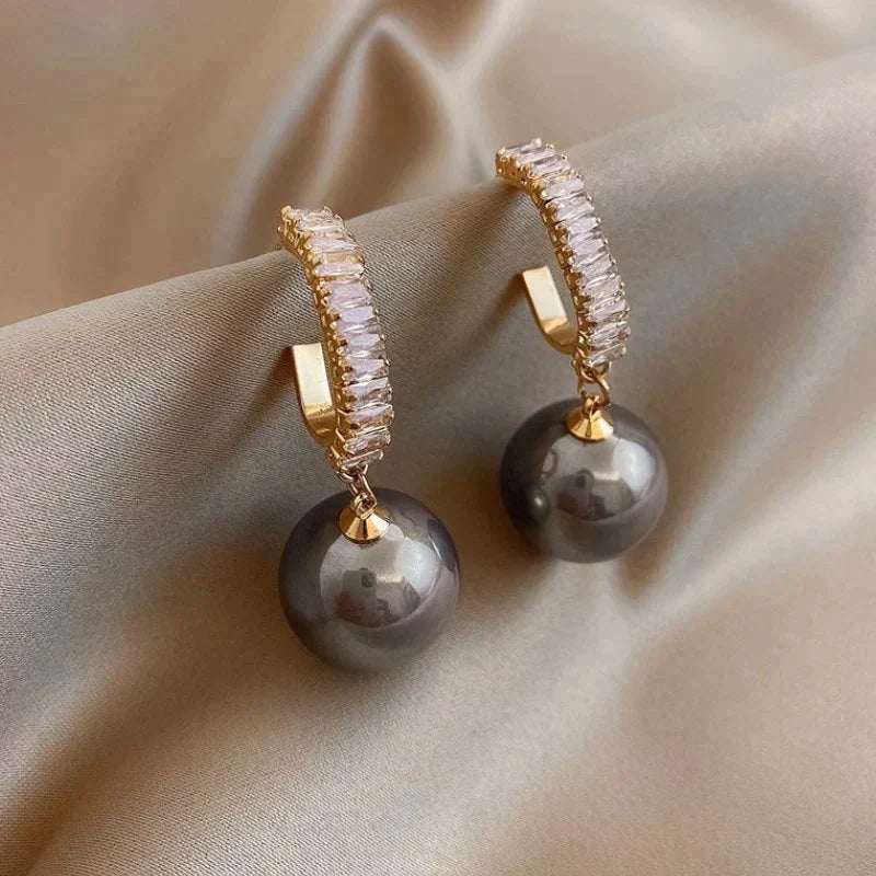 Orecchini di lusso con perla elegante e zirconi