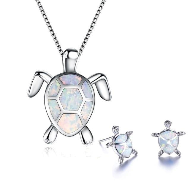 Set di collana e orecchini con tartarughe marine in opale