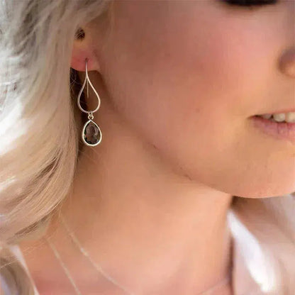 Orecchini pendenti con apertura a taglio