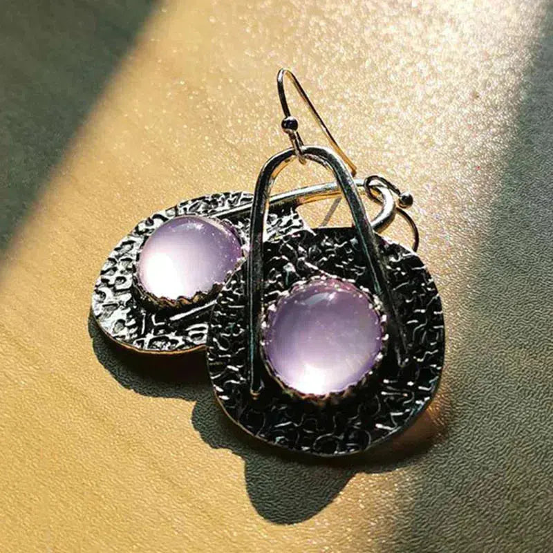 Orecchini boho con pietre viola in argento Sterling
