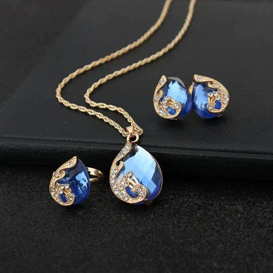 Set di Collana e Orecchini in Cristallo Blu su Attraversato in Oro