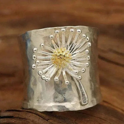 Anello a fascia larga con margherite in fiore