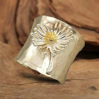 Anello a fascia larga con margherite in fiore