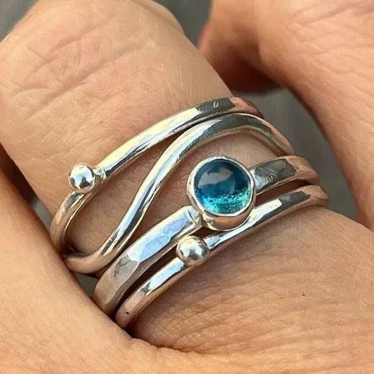 Anello a strati con cristallo blu
