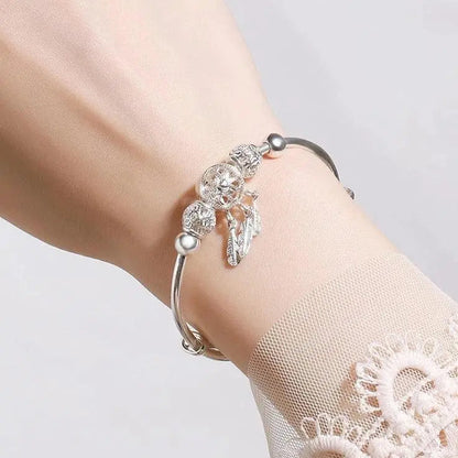 Braccialetto regolabile con charms a tripla foglia in argento 925