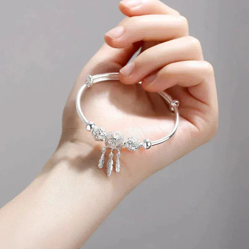 Braccialetto regolabile con charms a tripla foglia in argento 925