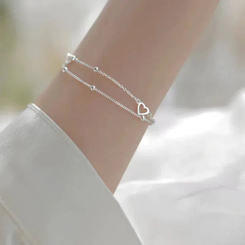 Bracciale regolabile a forma di cuore in argento