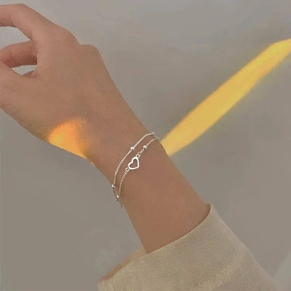Bracciale regolabile a forma di cuore in argento
