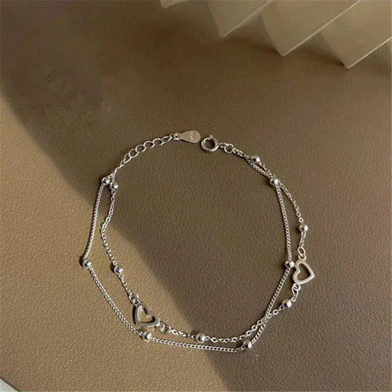 Bracciale regolabile a forma di cuore in argento