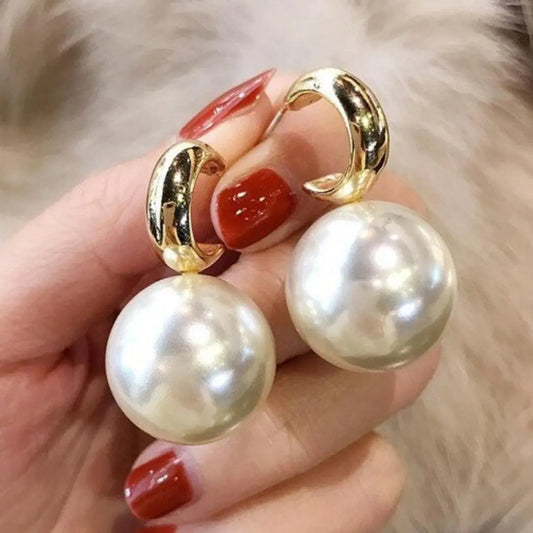 Orecchini grandi con perle d'oro