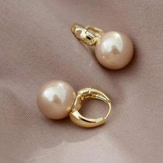 Orecchini in oro dorato con perle