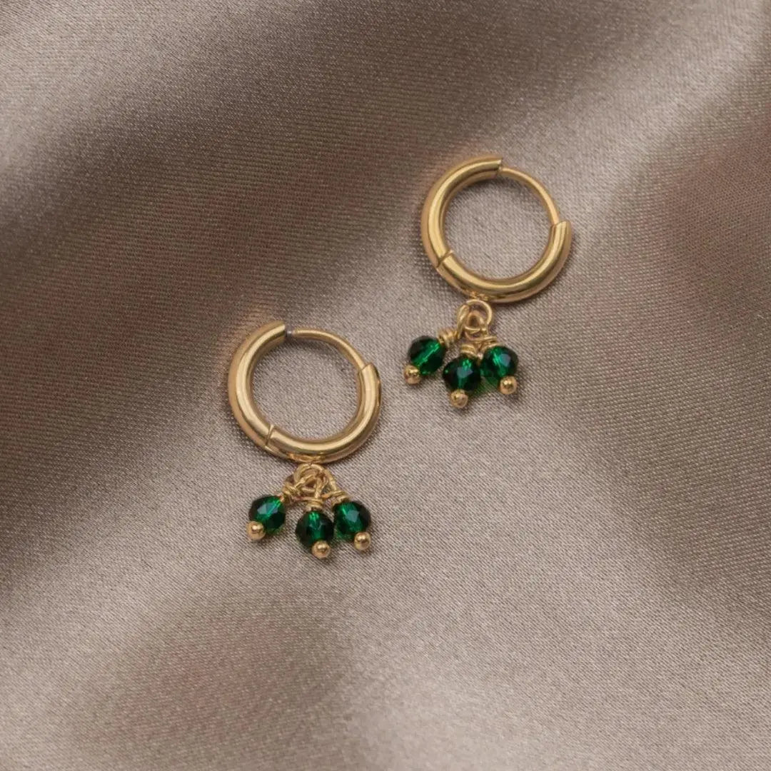 Orecchini singoli con triplo zirconia verde in oro