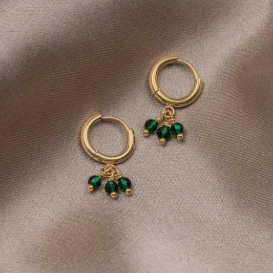 Orecchini singoli con triplo zirconia verde in oro