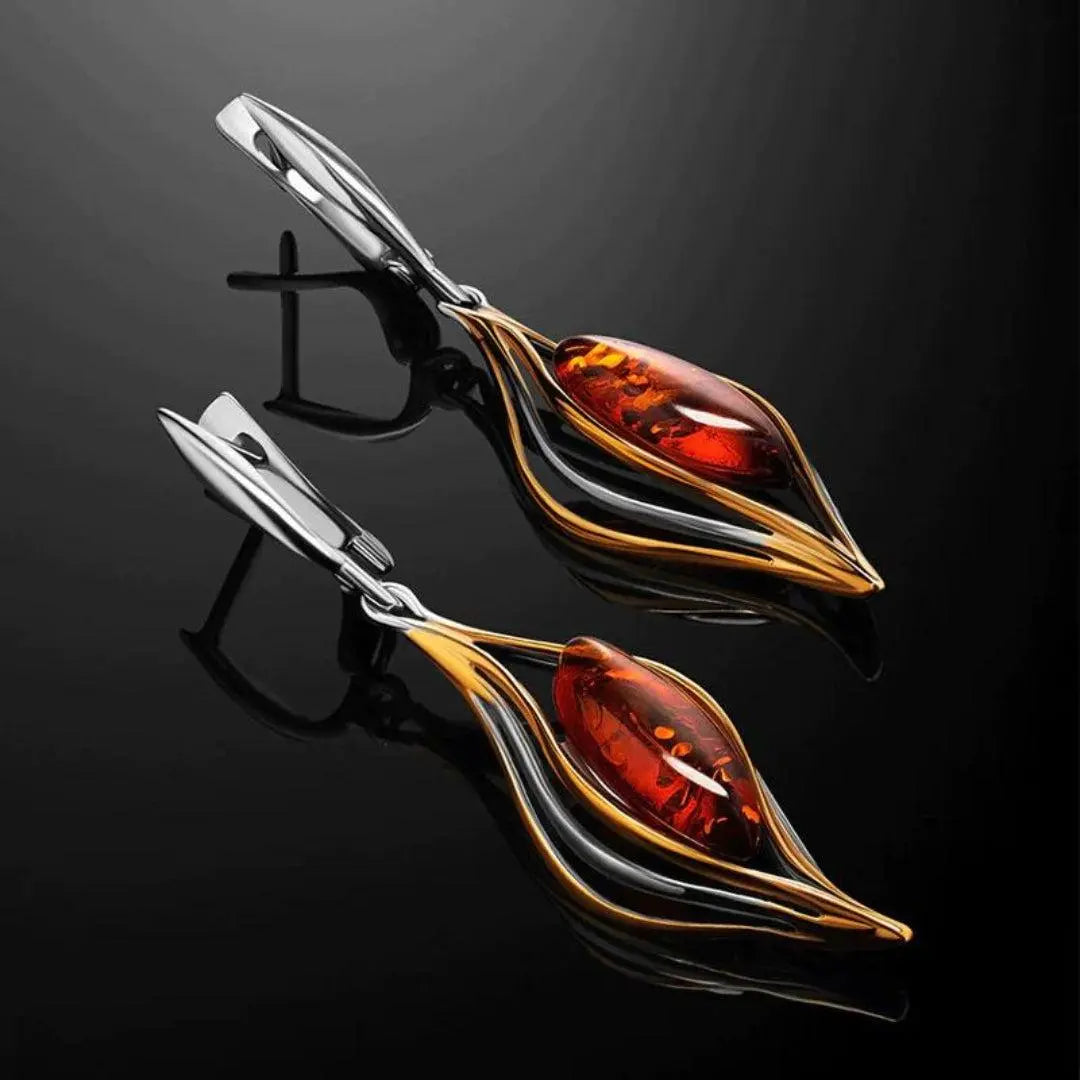 Orecchini pendenti a forma di fuoco in argento