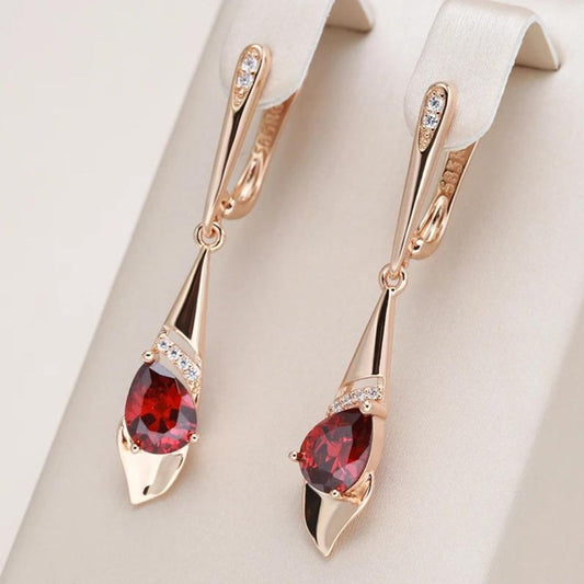 Pendente elegante con cristallo rosso in oro
