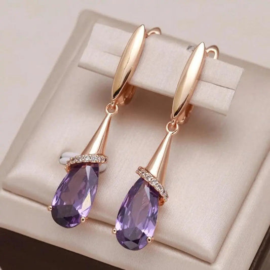 Orecchini con zirconia viola in oro