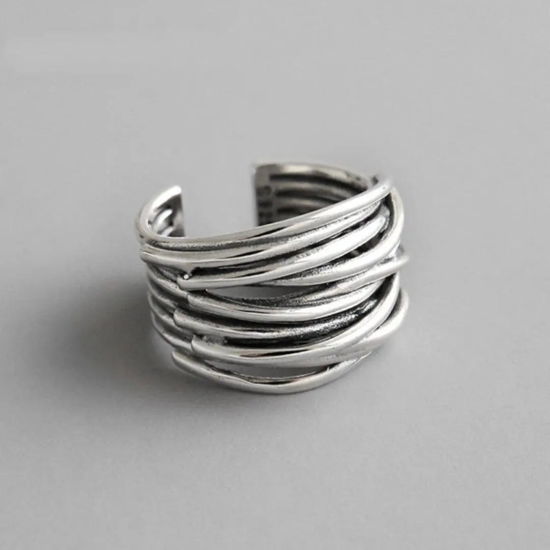 Anello regolabile con finitura in argento