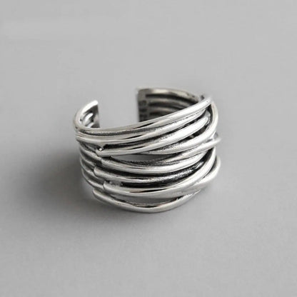 Anello regolabile con finitura in argento