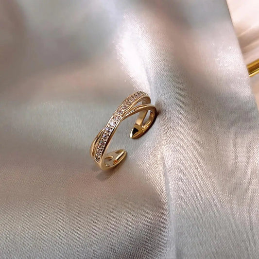 Anello con croce in zirconia regolabile in oro