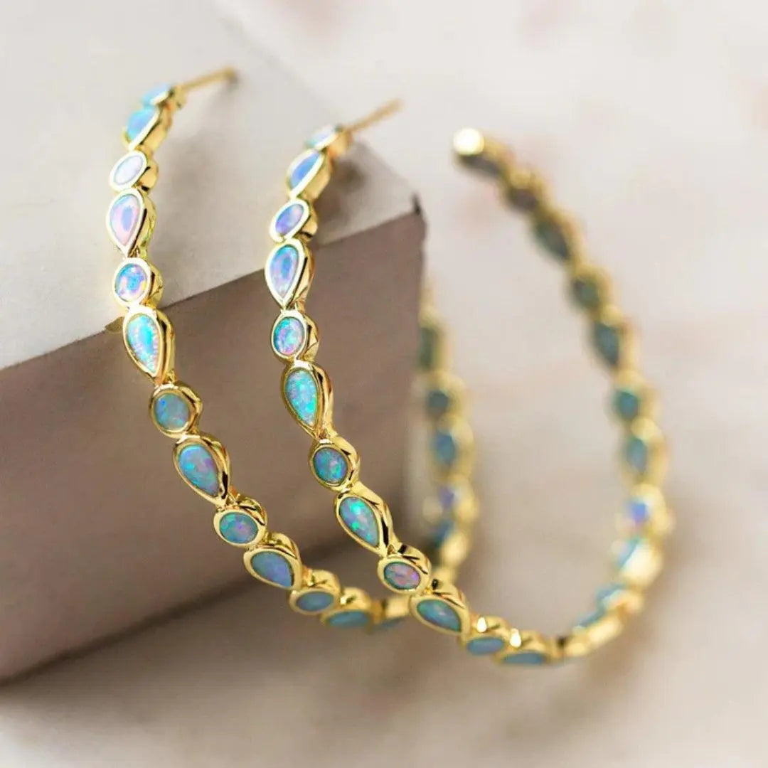 Orecchini d'oro con opale blu vintage