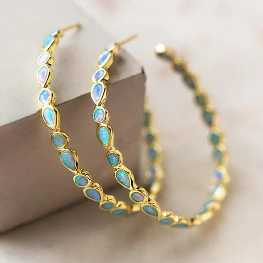 Orecchini d'oro con opale blu vintage