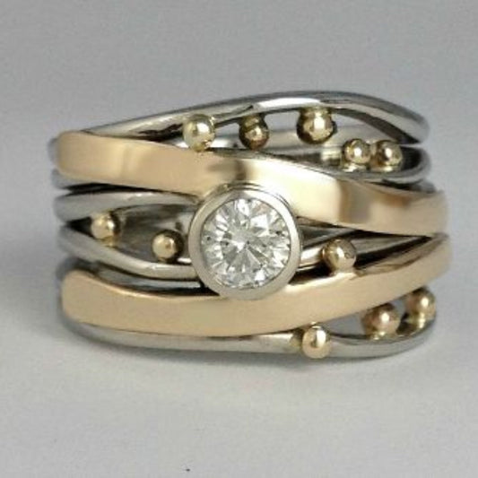 Anello vintage in oro con zirconia intarsiata