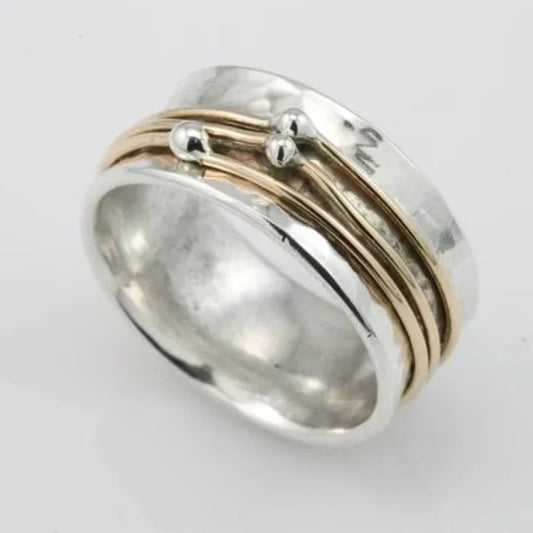 Anello d'argento a più strati con elementi in oro