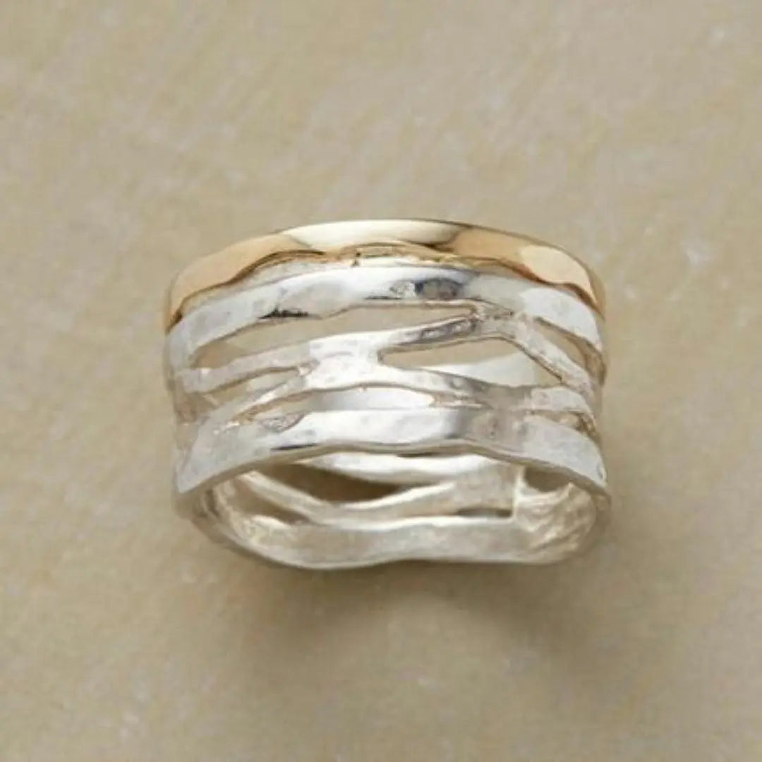 Anello vuoto vintage in oro e argento