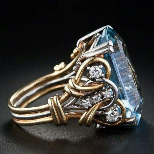 Anello in oro a strati con zaffiro blu